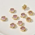 Detail of pink square zircon charms with 14k gold plating and side hollow patterns - Pink Zirconia Square / Pink