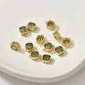 Macro shot of 14k gold plated square olive green zircon pendants for DIY jewelry making - Olive Green