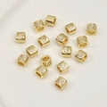 Detailed view of 14k gold plated cylindrical beads with number 9 cubic zirconia inlay - Number 6 / 1 Piece (Approx. 6.5x5.2mm)