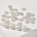Detail of silver gear spacer beads with pavé set zircons paired with white pearls - 17# Silver Wheel Zirconia Spacer