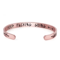 Close-up of rose gold cuff bracelet with KEEP FUCKING GOING inspirational engraving - C-Shape (B830) / Rose Gold