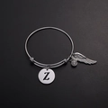 Silbernes Titanstahl-Armband mit Buchstabe Z Anhänger, Flügel und Kristallakzent - Stil Z