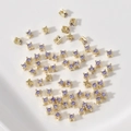 Vista macro de cuentas de circón púrpura con engaste de oro KC para joyería artesanal DIY - Púrpura Claro (7# 3x3mm)