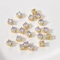 Vista detallada de cuentas espaciadoras de cobre chapado en oro con circonitas para joyería DIY - Púrpura Claro (18# 4x4mm)