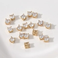 Macro-opname van vergulde zirkonia kralen met 4-klauwzetting voor DIY-sieradenprojecten - Transparant Wit (13# 4x4mm)