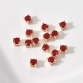 Primer plano de cuentas redondas de circón rojo con engastes dorados de cuatro garras para bricolaje - Rojo Chino (16# 4x4mm)