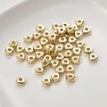 Détail macro de perles triangulaires plaquées or 14k avec finition miroir pour bijoux DIY - Perle d'espacement triangulaire (1#) / Petit (1 pièce) / Or