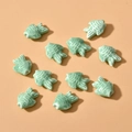Flat lay macro of eleven light green fish-shaped ceramic beads for DIY jewelry making - Small Fish Style (12#) / 1 Piece / Green