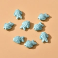 Close-up of light blue ceramic fish beads for DIY jewelry making with glazed scale texture - Small Fish Style (10#) / 1 Piece / Lake Blue
