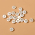 Macro view of gold-plated sunburst charms on white mother-of-pearl round shell beads - Sun (4#) / 1 Piece / White