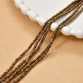 Macro detail of 2mm bronze gold-plated hematite square beads for DIY jewelry making - Bronze (24#)