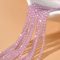 Nahaufnahme von 2mm facettierten lavendelfarbenen Zirkonperlen für DIY-Schmuck und Ketten - Rosa Zirkon