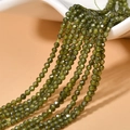 Close-up of 2mm dark green faceted zircon beads for DIY jewelry making and crafts - Olive Green Zirconia