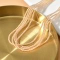 Detalle de cuentas facetadas de ojo de gato de 2mm para joyas elegantes de varias capas - Naranja Claro