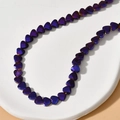 Macro detail of 6mm faceted heart beads with iridescent purple-blue metallic gradient finish - 2# Purple Faceted Heart (Approx. 70 Pcs/Strand)