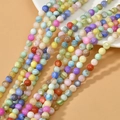 Gros plan de perles œil de chat colorées de 6-8mm pour la création de bijoux DIY - 6mm (1 Brin environ 65 perles)