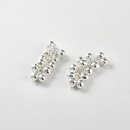 Macro detail of polished silver grape cluster beads for DIY jewelry making accessories - Silver Small Grape