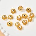 Amber flower millefiori beads with evil eye design on a white ceramic tray - 14# Amber Millefiori Bead