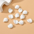 Close-up of irregular white glazed leaf-shaped beads for DIY jewelry making - 1 Piece Pack / Porcelain White