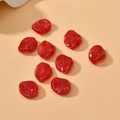 Macro shot of 9 red translucent irregular glass leaf beads for DIY jewelry making - 1 Piece Pack / Red