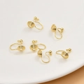 Macro shot of six 14k gold plated spiral clip-on earring converters on white ceramic - 18k Gold Bead Style