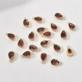 Macro view of teardrop red zircon pendants with 14k gold plated copper for DIY jewelry - Wine Red Waterdrop