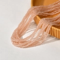 Macro detail of 3mm light pink faceted glass beads for DIY jewelry making and crafts - Flesh Pink (17#)