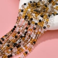 3mm faceted glass beads in autumn colors for DIY jewelry making displayed on pink background - Black Gray White Mixed Transparent