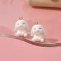 Close-up of white flocked bunny charms with pink blush and golden metal rings - 10# Big Ear Rabbit (21x24mm)