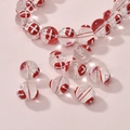 Christmas themed glass beads for DIY jewelry making with red and white snowflake pattern - Gift Box Round Bead