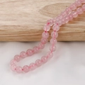 Macro view of natural rose quartz round beads showing polished texture for jewelry DIY - Rose Quartz (29#) / 8mm (Approx. 46 Pieces/Strand)
