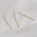 Close-up of three gold-plated snake chains with closed loops for DIY earring making - Double Loop Gold Tone, 36mm x 1mm (10 Pieces)
