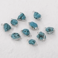 Detailed view of irregular turquoise connectors with silver-plated edges for DIY jewelry - Double Loop Silver Edged Turquoise Style (2B-003)