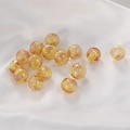 Macro detail of round glass beads with orange spiral patterns for DIY jewelry making - Red and Yellow Style (5#) / 1 Piece / Red Yellow Gradient