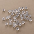 Close-up of star-shaped silicone earring backs with metal core for 18k gold stud earrings - Star Silver Plated
