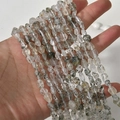 Macro view of hand-held irregular natural green phantom crystal beads for DIY jewelry - Irregular Chips (28#) / 1 Piece / Green Rutilated Quartz