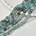 Macro detail of irregular aquamarine semi-precious stone beads for jewelry DIY - Irregular Chips (20#) / 1 Piece / Apatite