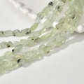 Close-up of irregular light green natural semi-precious stone beads for DIY jewelry - Irregular Chips (4#) / 1 Piece / Prehnite