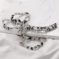 Macro shot of 3-5mm black and white irregular natural crystal stone beads on silk thread - 8# Black Rutilated Quartz (1 Strand)