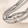 Macro detail of square hematite spacer beads in silver and gold for DIY jewelry making - 4x4mm (Approx. 390 Pieces) / White Gold
