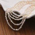 Multi-layer natural baroque freshwater pearl necklace on a white textured ceramic plate - Baroque Irregular / 3-4mm (Approx. 34cm) / White