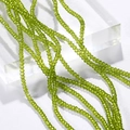 Detailopname van 3mm olijfgroene gefacetteerde kristallen kralen voor DIY-sieraden maken - Set van 100 stuks / Olijfgroen (4#)