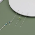 Three flexible big eye beading needles on a green background with colorful seed beads - 63mm Opening Needle (1 Pc)