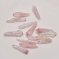 Detailed view of pale pink aura crystal points with iridescent coating for DIY jewelry - 1# Pink