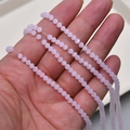 Detailed macro view of 4mm multi-faceted pink crystal glass beads for DIY jewelry - 2# Pink Jade