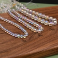 Detailed comparison of 6mm, 8mm, and 10mm iridescent glass beads with aurora borealis finish - 8mm (Approx 50 Pieces) / AB Color