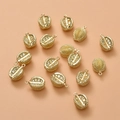 Macro shot of 14K gold plated durian pendants with sparkling crystal rhinestones for DIY - Durian Pendant / Gold