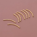 Detailed macro view of 18K gold-plated curved spacer beads with spiral texture for DIY jewelry - Curved Tube / 1.5*25mm (10 Pcs) / Gold