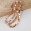 Strand of 8mm champagne star-shaped crystal beads with a shiny metallic finish - Approx. 80 Beads per String / Champagne Star
