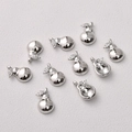 Macro view of 14K gold plated pear shaped jewelry pendants with sparkling zircon leaves - Pear Pendant / Silver